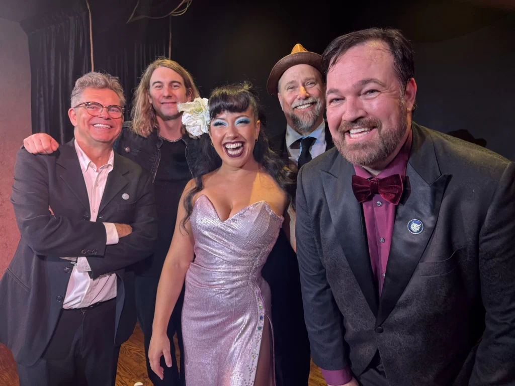 Dana Gould, Marcus Monro, Lilikoi Kaos, Karl Herlinger, and Matt Donnelly the Mind Noodler smiling for the camera at The Peacock theater