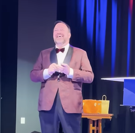 Matt Donnelly the Mind Noodler laughing onstage